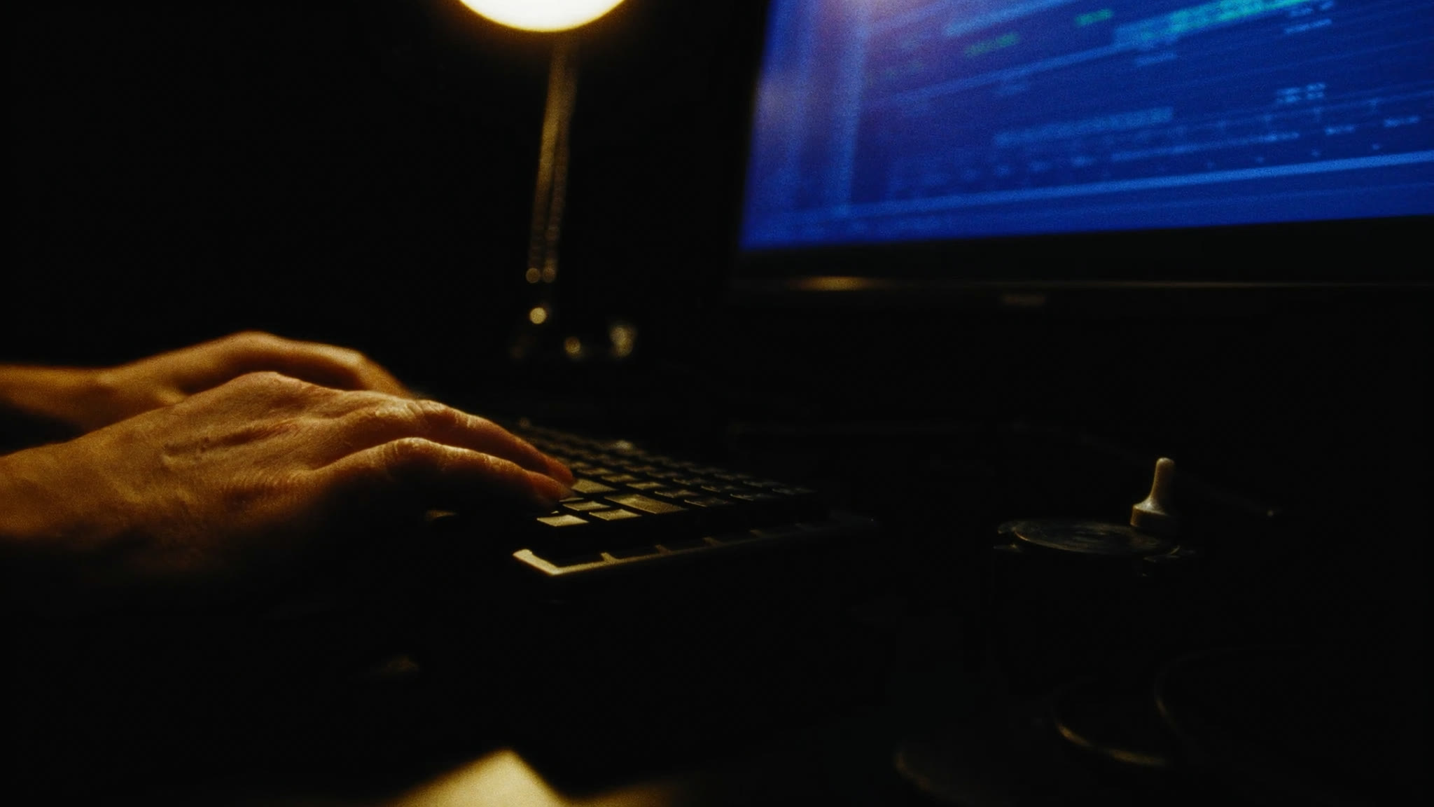Hands on an editing keyboard